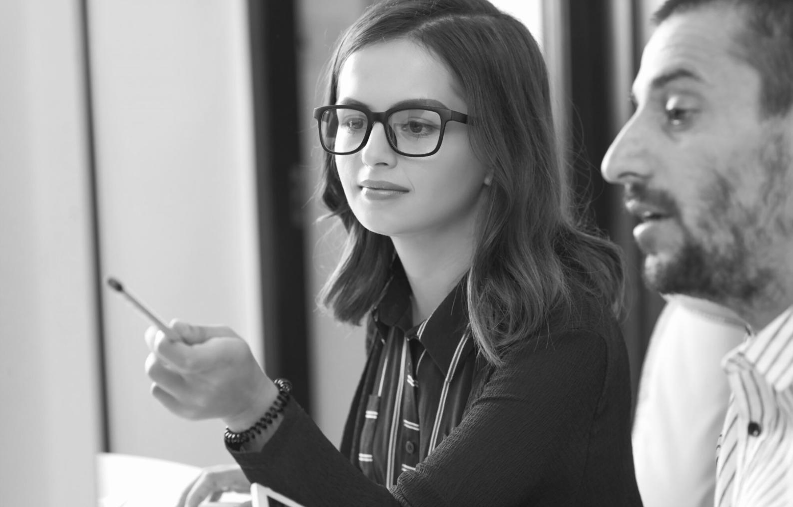 International students reviewing financial documents and budgeting materials together